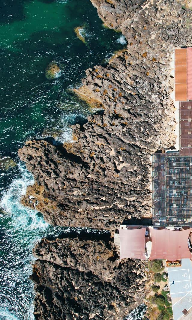 Aerial view of the Furnas do Guincho restaurant on the cliff